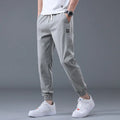 Men's Casual Loose Drawstring Sports Pants - Trendy Design